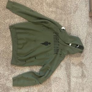 Medium sized custom green hoodie.